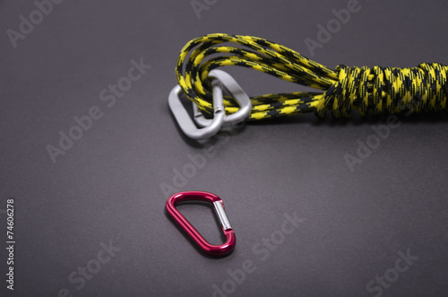 Mountaineers' carabiner with climbers rope
