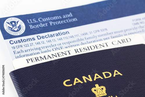 Canadian passport, permanent resident card and form.