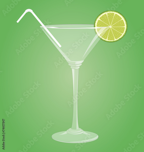 Empty glass for martini with lime and plastic tube on green back