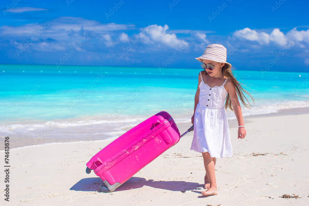 Adorable little girl during beach vacation have fun Adorable little girl during beach vacation have fun