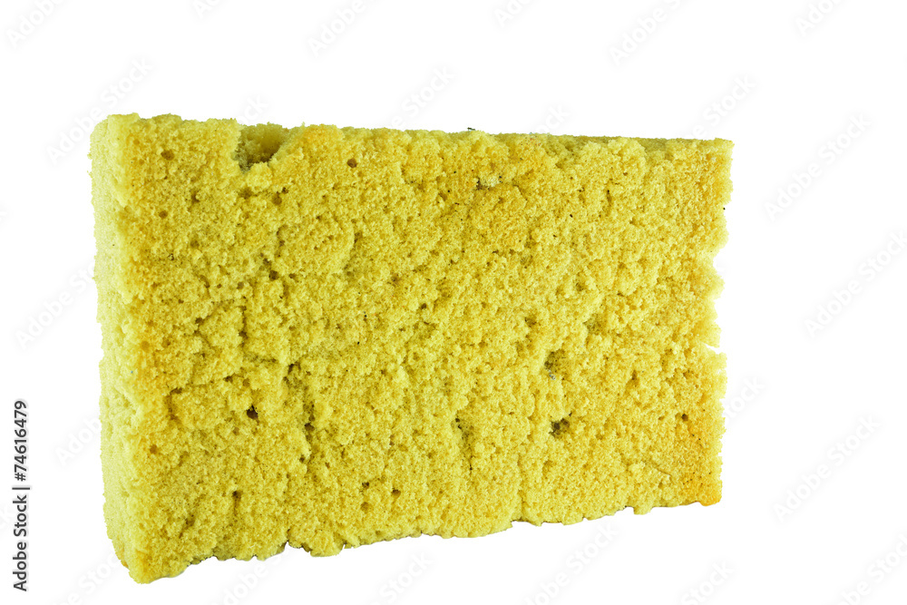 Fototapeta premium old used yellow sponge on white background