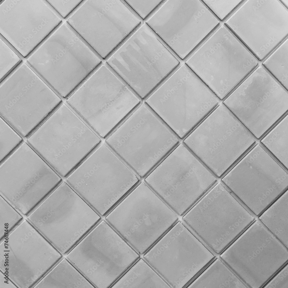 Gray wall tiles as a background or texture Gray wall tiles as a background or texture