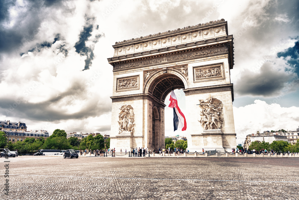 PARIS - MAY 21, 2014: Tourists at Arc de Triomphe. More than 30