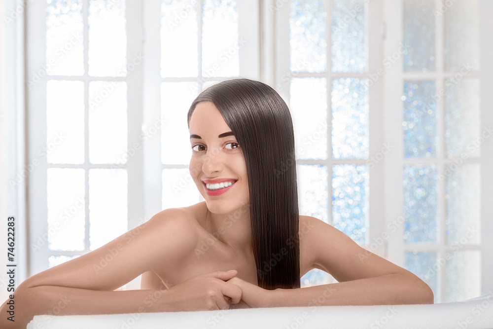 Portrait of woman with beautiful hair in spa salon