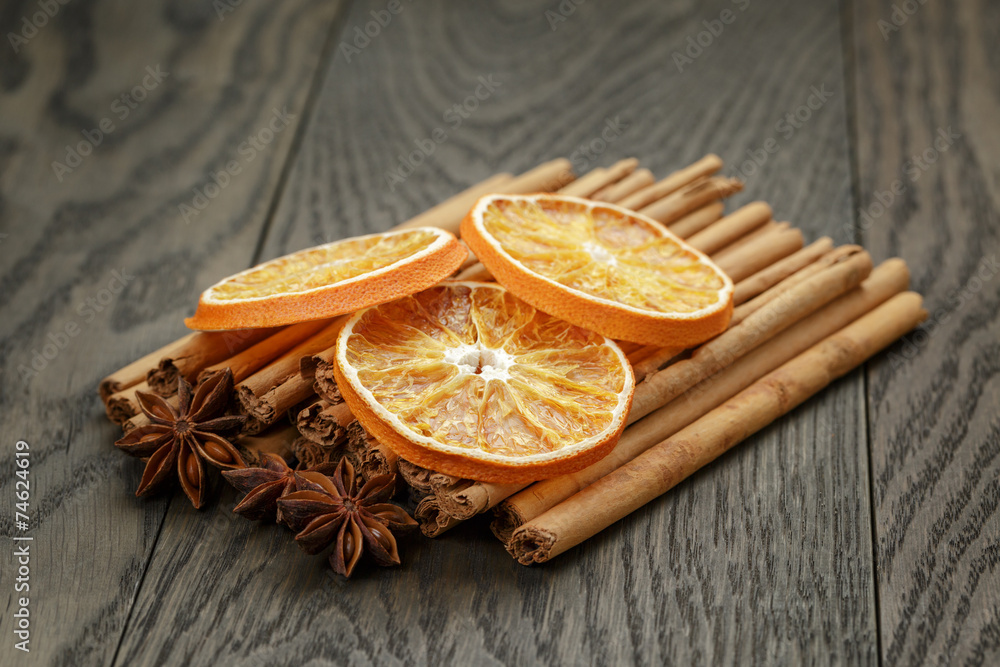 true cinnamon sticks and dried oranges true cinnamon sticks and dried oranges