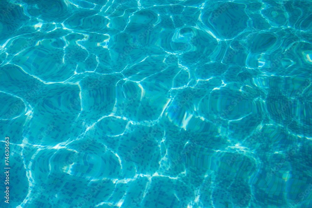Blue background from mosaic and crystal clear water