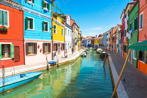 Canal and colorful buildings in Burano island  Venice  Italy