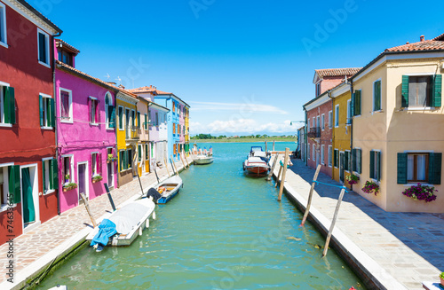 Canal and colorful buildings in Burano island, Venice, Italy © Ekaterina Belova