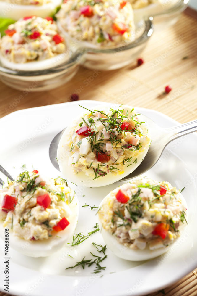 stuffed eggs with ham, red pepper and dill