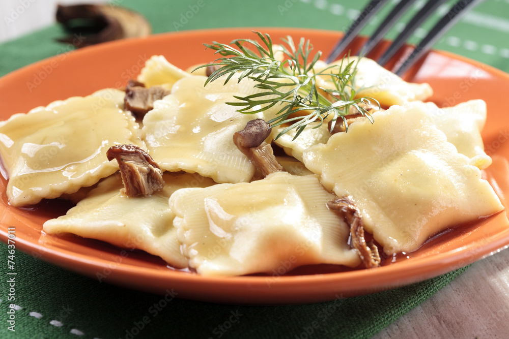 Portion of ravioli with mushrooms and sauerkraut Portion of ravioli with mushrooms and sauerkraut