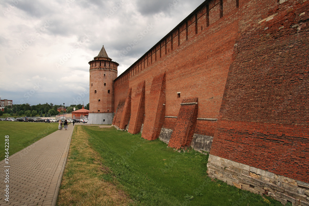 People walk by old walls of Kolomna Kremlin