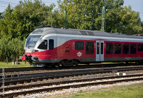 Commuter train approaches the train station.