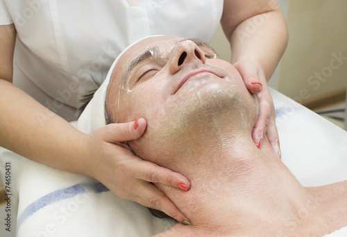 man in a beauty salon facial and massage