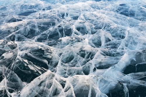 Surface of frozen Lake Baikal. Ice figure interlacing cracks