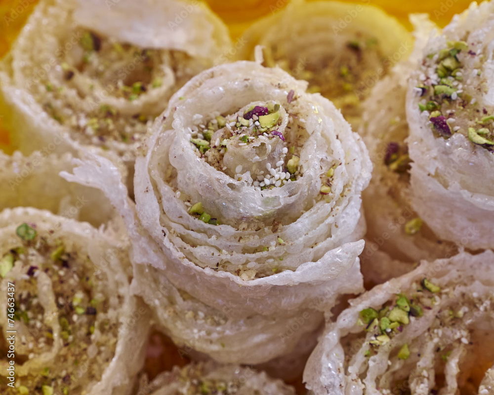 Diples, gourmet Greek Christmas sweet with nuts and honey syrup Diples, gourmet Greek Christmas sweet with nuts and honey syrup
