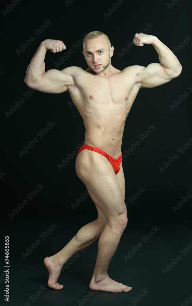 Bodybuilder posing Bodybuilder posing