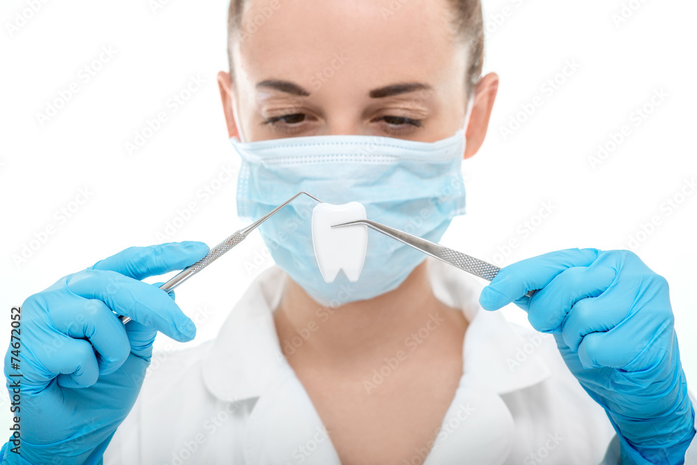 Dentist operating tooth Dentist operating tooth
