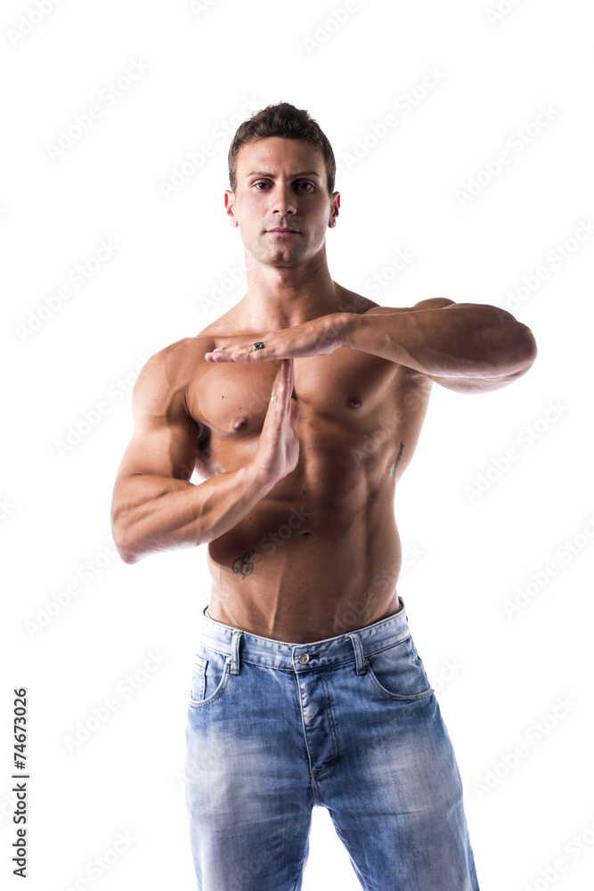 Fototapeta premium Fit shirtless muscle man gesturing time out sign with his hands