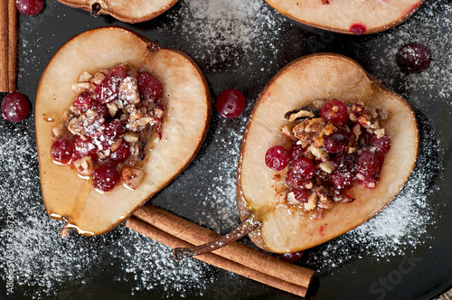 Baked pears with cranberries, honey and walnuts