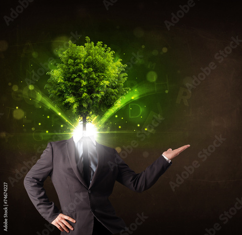Fototapeta Naklejka Na Ścianę i Meble -  Man with green tree head concept