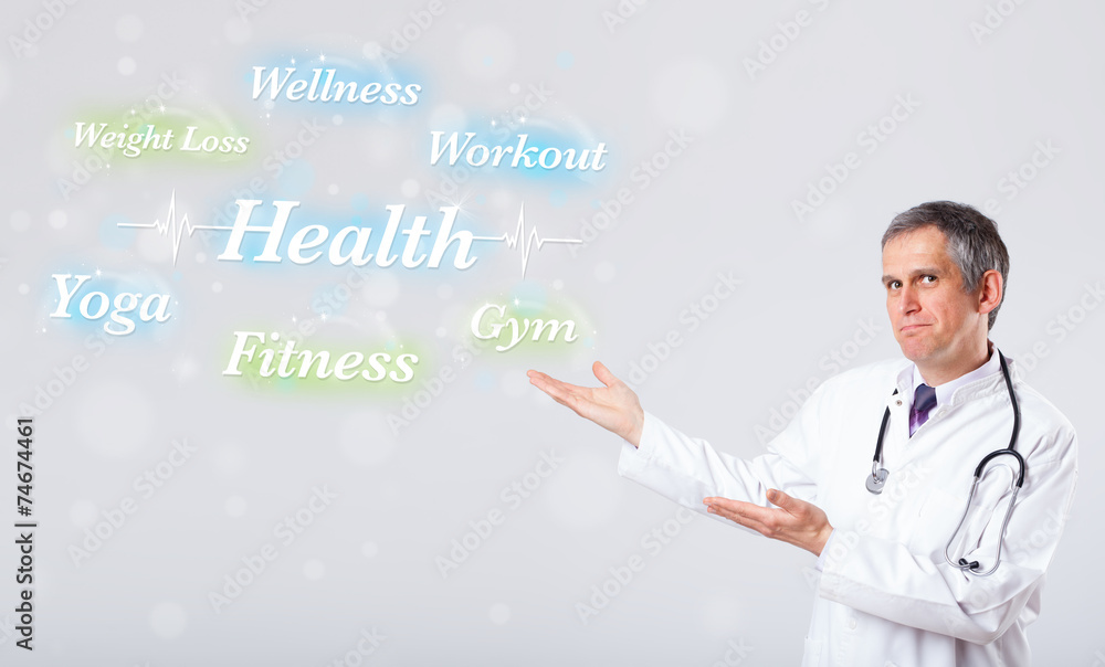Clinical doctor pointing to health and fitness collection of wor Clinical doctor pointing to health and fitness collection of wor