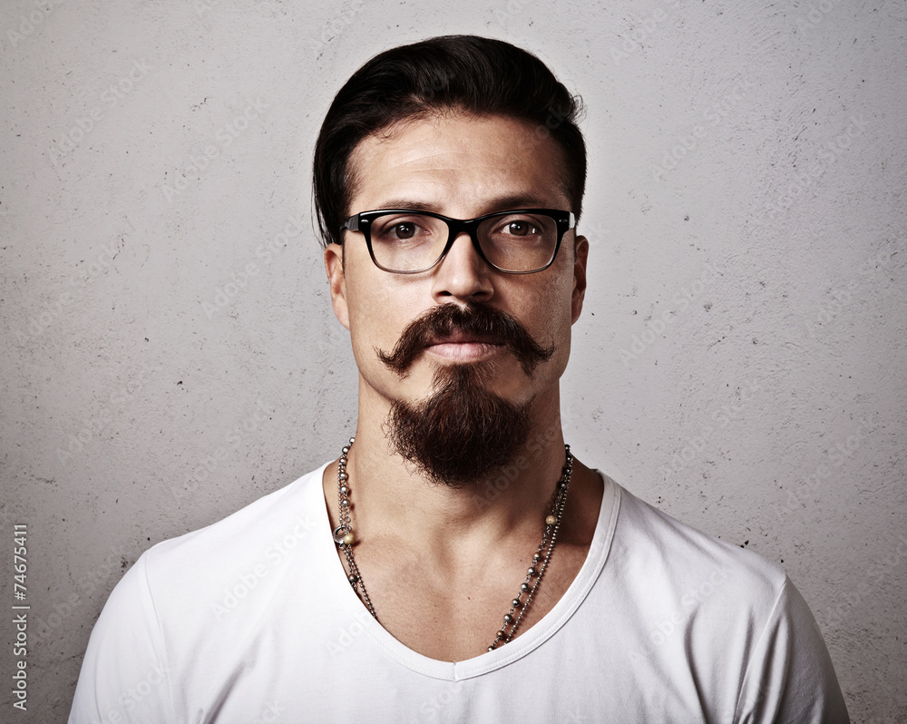 Portrait of a bearded man wearing eyeglasses Portrait of a bearded man wearing eyeglasses