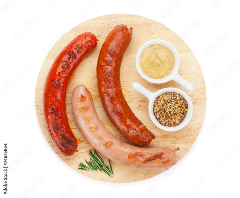 Various grilled sausages with condiments Various grilled sausages with condiments