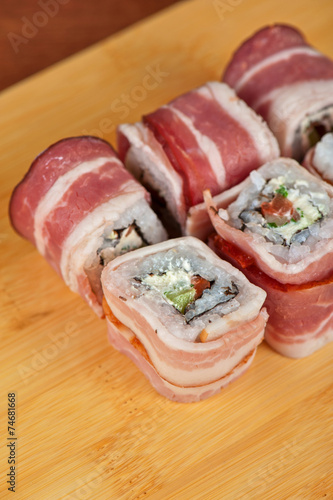 Sushi roll with bacon