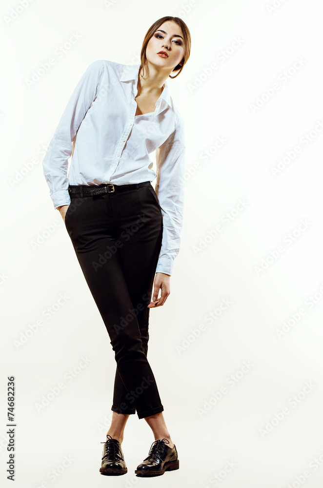 Female beauty concept. Portrait of fashionable young girl in cla Female beauty concept. Portrait of fashionable young girl in cla