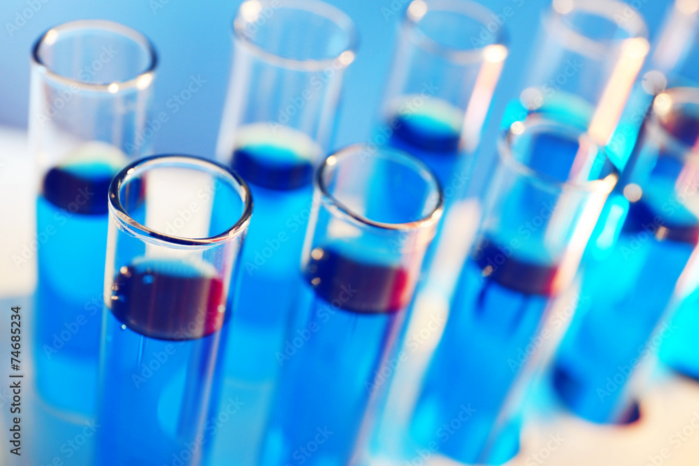 Test-tubes filled with color fluid close-up Test-tubes filled with color fluid close-up