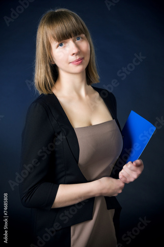 Woman with folder in business suit
