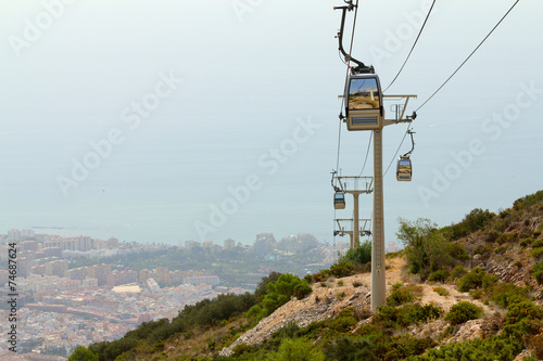 Cableway of city near sea