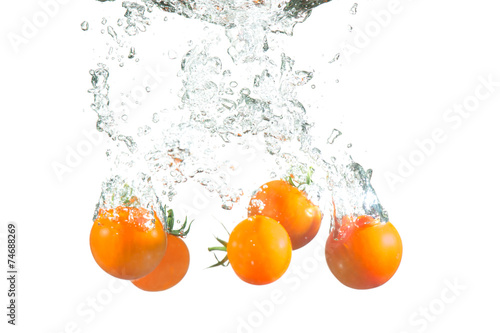 Splashing tomatoes