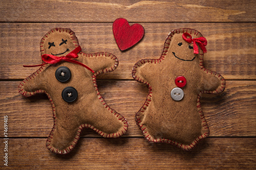 Textile toys in the shape of gingerbread men for Valentine's Day