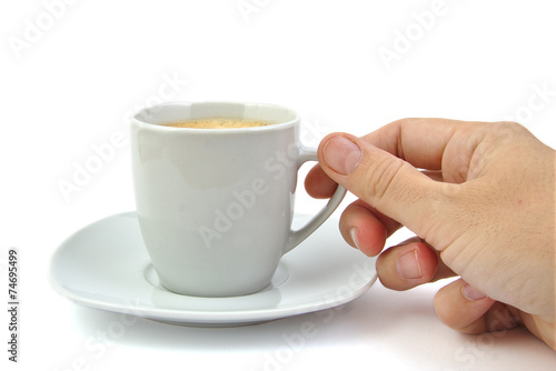 Hand and a cup of coffee