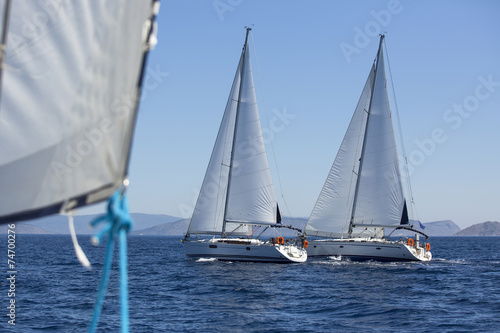 Sailing boats during a sea race. Yacht. Sailing.