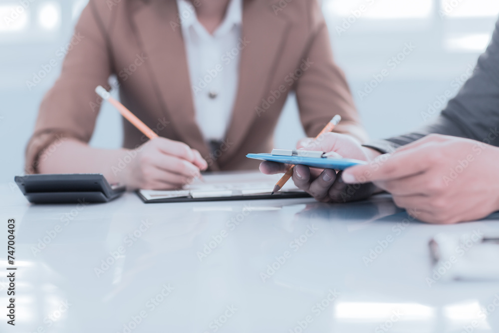 Business people discussing during a meeting Business people discussing during a meeting
