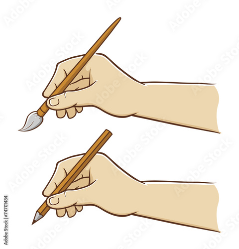 Hand holding pencil and brush