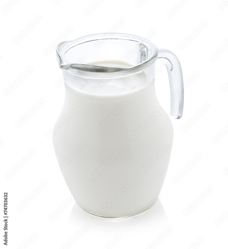 Glass jug of fresh milk isolated on white Glass jug of fresh milk isolated on white