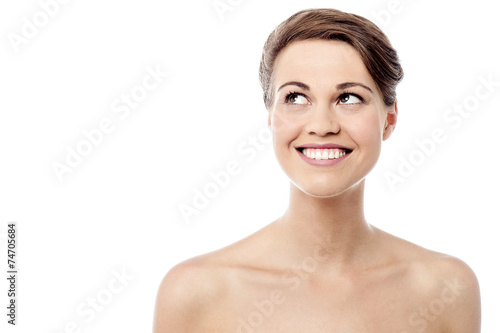 Elegant woman with bare shoulders