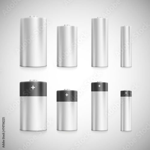 Set standard size batteries on a scale.