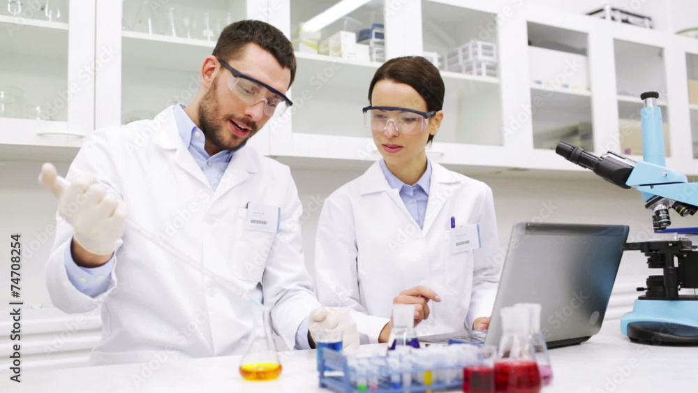 young scientists making test or research in lab young scientists making test or research in lab