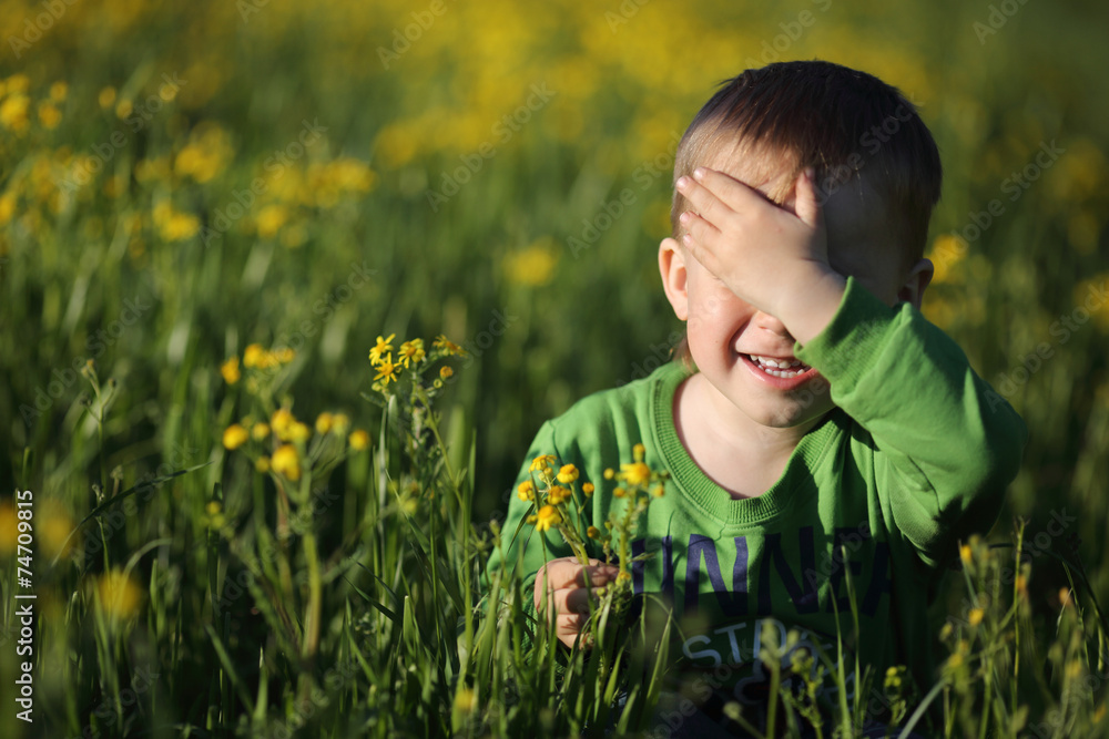 Portrait of a boy on the meadow Portrait of a boy on the meadow