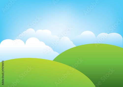 Natural landscape- Green hills and fluffy clouds
