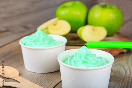 Frozen creamy ice yoghurt  with fresh green apples photo