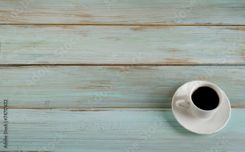Coffee on blue wooden background