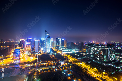 modern cityscape and traffics during night