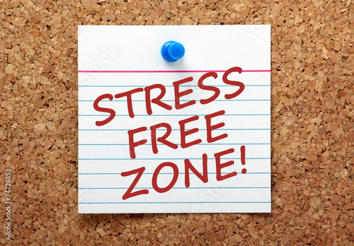 The phrase Stress Free Zone on a note pinned to a notice board