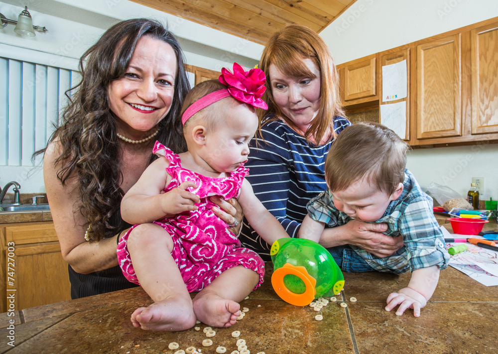 Fototapeta premium Mothers Play With Their Babies