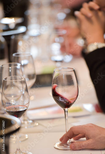 Senior Man Holding Glass of Red Wine